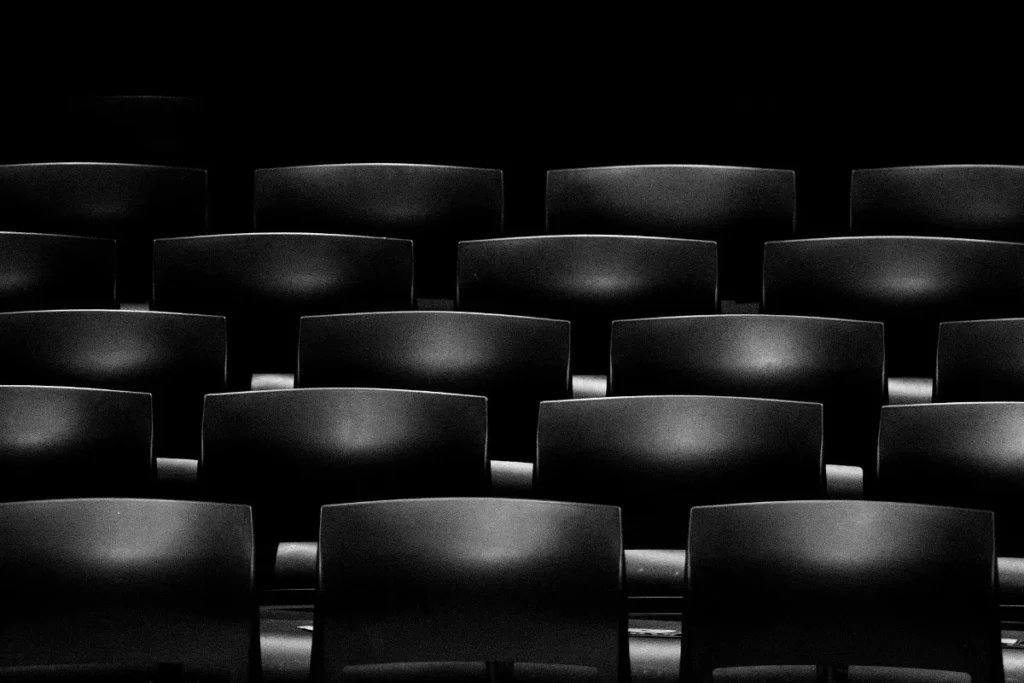 Rows of dark theater seats for a guide to legit IPTV services